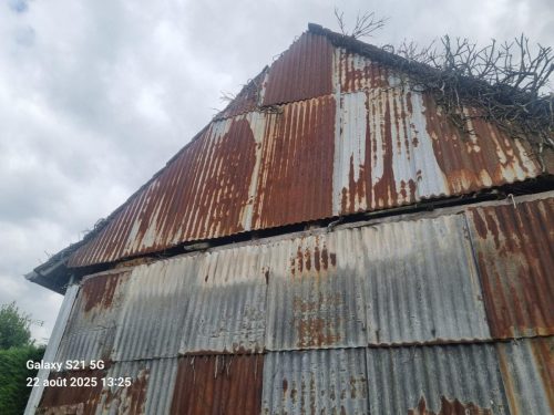 rénovation d'un pignon en tôle