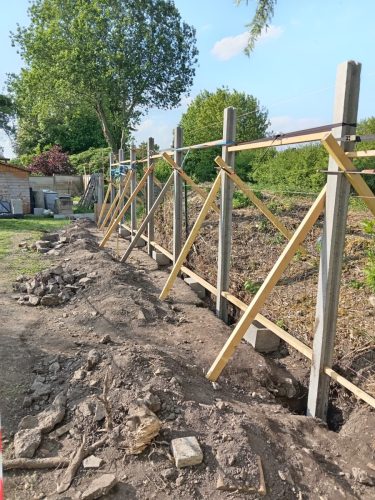 Réalisation d'une clôture en dalle béton 